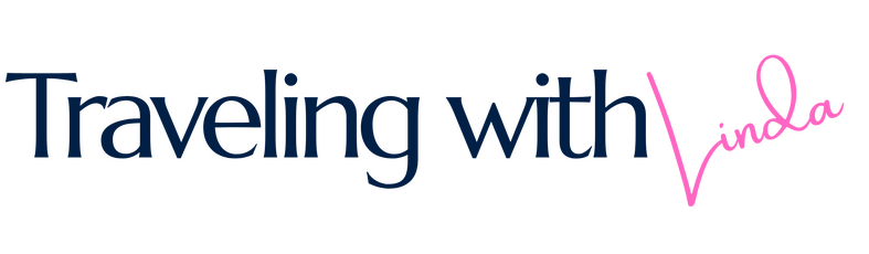 Image of signature L of Traveling with Linda